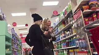 Sexy blonde chick gets caught on spy cam in the shop