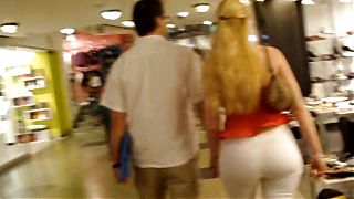 Spying on stunning blonde milf in the shopping center